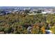 Aerial view of home located in the outskirts of an urban city at 303 Laurel Hill Road, Chapel Hill, NC 27514