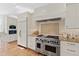 Elegant kitchen features custom cabinetry, professional-grade appliances, and stylish finishes at 303 Laurel Hill Road, Chapel Hill, NC 27514