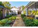 Manicured landscaping with flower beds and manicured shrubs and trees at 303 Laurel Hill Road, Chapel Hill, NC 27514
