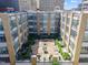 Aerial view of building with courtyard offering outdoor seating and a common area at 319 Fayetteville St # 509, Raleigh, NC 27601