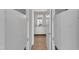Bathroom with bright mirrors and white cabinetry at 319 Fayetteville St # 509, Raleigh, NC 27601