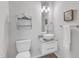 Modern bathroom featuring a vessel sink, stylish mirror, and minimalist design at 319 Fayetteville St # 509, Raleigh, NC 27601
