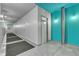 Clean, well-lit hallway with colorful accents, providing access to the units with modern lighting at 319 Fayetteville St # 509, Raleigh, NC 27601