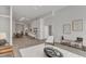 Spacious open concept living room with modern furniture, dining area, and lots of natural light at 319 Fayetteville St # 509, Raleigh, NC 27601