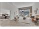 Well-lit living room showcases a cozy seating area and a glimpse into the comfortable bedroom at 319 Fayetteville St # 509, Raleigh, NC 27601