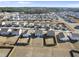 Expansive aerial view of a well-planned community with numerous homes, highlighting the neighborhood's layout and design at 3517 Strawberry Patch Row, Raleigh, NC 27604