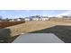 Large backyard featuring a bare lawn, a concrete patio, and a wooden fence at 3517 Strawberry Patch Row, Raleigh, NC 27604