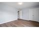 Bright bedroom with hardwood flooring, modern design, and ample closet space at 3614 Kilgo Dr, Durham, NC 27705
