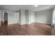 Spacious bedroom with hardwood flooring, neutral walls and ample closet space at 3614 Kilgo Dr, Durham, NC 27705