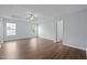 Large bedroom with tray ceilings, recessed lights, and hardwood floors at 3614 Kilgo Dr, Durham, NC 27705
