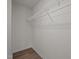 Walk-in closet with basic wire shelf and hardwood floors at 3614 Kilgo Dr, Durham, NC 27705