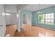 Inviting dining room with hardwood flooring, decorative columns, chandelier, and abundant natural light at 3614 Kilgo Dr, Durham, NC 27705