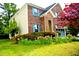 A well-maintained two-story home with brick, siding, and mature landscaping at 3614 Kilgo Dr, Durham, NC 27705