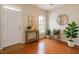 Inviting foyer featuring hardwood floors, a console table, and modern decor at 3614 Kilgo Dr, Durham, NC 27705