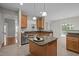 Modern kitchen island with granite countertops, stainless steel appliances, and open concept design at 3614 Kilgo Dr, Durham, NC 27705