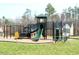 Community playground with a variety of equipment for children to enjoy, creating a fun and active environment at 3614 Kilgo Dr, Durham, NC 27705