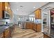 Spacious kitchen with stainless steel appliances, granite countertops, and wooden cabinets at 3621 Colby Chase Dr, Apex, NC 27539