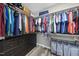 Spacious walk-in closet with custom shelving, drawers, and hanging rods at 3621 Colby Chase Dr, Apex, NC 27539