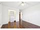 Bedroom featuring hardwood floors and open closet at 3719 Hermine St, Durham, NC 27705