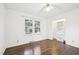 Bedroom featuring hardwood floors, a ceiling fan and plenty of natural light at 3719 Hermine St, Durham, NC 27705