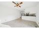 Kitchen and dining area has a ceiling fan and stainless steel refrigerator and microwave at 3719 Hermine St, Durham, NC 27705
