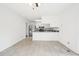Spacious kitchen with stainless steel appliances and adjacent dining area at 3719 Hermine St, Durham, NC 27705
