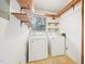 Laundry room featuring washer, dryer and open shelving at 3719 Hermine St, Durham, NC 27705
