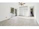Open living and dining space with built in shelving, and access to the backyard at 3719 Hermine St, Durham, NC 27705