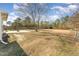 Spacious backyard with a concrete patio and plenty of room for outdoor activities and enjoyment at 38 Colonial Hills Dr, Lillington, NC 27546