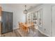 Cozy dining area bathed in natural light from bay window at 38 Colonial Hills Dr, Lillington, NC 27546