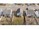 Aerial view of backyard featuring grass, a small porch and fenced perimeter in a suburban neighborhood at 3800 Cross Timber Ln, Raleigh, NC 27603