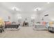 Spacious bedroom featuring two beds with stylish decor, bright windows, and modern lighting at 3800 Cross Timber Ln, Raleigh, NC 27603