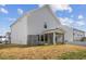 Exterior of home featuring a screened porch, shed, and limited lawn space at 3800 Cross Timber Ln, Raleigh, NC 27603