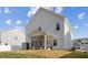 Exterior view of home with screened-in porch and flat backyard at 3800 Cross Timber Ln, Raleigh, NC 27603