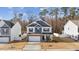 Charming two-story home with a brick facade, a two-car garage, and manicured landscaping at 3800 Cross Timber Ln, Raleigh, NC 27603