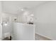 Bright hallway with access to multiple rooms and a staircase, showcasing the home's layout at 3800 Cross Timber Ln, Raleigh, NC 27603