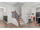 Hallway view with staircase to the left, kitchen and kitchen dining to the right at 3800 Cross Timber Ln, Raleigh, NC 27603
