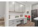 Bright kitchen features white cabinets, stainless appliances, and ample countertop space at 3800 Cross Timber Ln, Raleigh, NC 27603