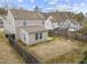 View of the back exterior, patio, fenced in yard, and vinyl siding at 3811 Chehaw Dr, Raleigh, NC 27610