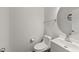 A clean and bright bathroom featuring modern fixtures, vanity, and a round mirror at 3811 Chehaw Dr, Raleigh, NC 27610