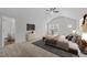 Bedroom with a vaulted ceiling featuring carpeted floors, natural light, and ensuite bathroom at 3811 Chehaw Dr, Raleigh, NC 27610