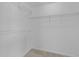 Walk-in closet with ample shelving space and carpet flooring at 3811 Chehaw Dr, Raleigh, NC 27610