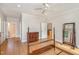 Bright bedroom offers hardwood floors and neutral paint; potential for relaxing, comfortable retreat at 4 Tocuvan Pl, Durham, NC 27705