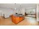 Open kitchen with an island, stainless steel appliances, and a breakfast bar at 4 Tocuvan Pl, Durham, NC 27705