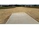 Cleared lot prepared for construction, showcasing ample space and a concrete foundation at 432 Springtooth Dr, Zebulon, NC 27597