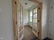 Home office with elegant french doors and a large window providing natural light at 432 Springtooth Dr, Zebulon, NC 27597