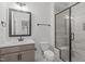 Bathroom boasts a glass shower, modern vanity, and sleek fixtures at 4508 Chandler Creek Pl, Apex, NC 27539