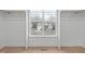 Walk-in closet with a window providing backyard views at 4508 Chandler Creek Pl, Apex, NC 27539