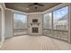 Screened porch with wood burning fireplace at 4508 Chandler Creek Pl, Apex, NC 27539