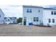 View of a cozy backyard featuring lawn and patio with a light blue home exterior at 4914 Arkose Dr, Raleigh, NC 27610